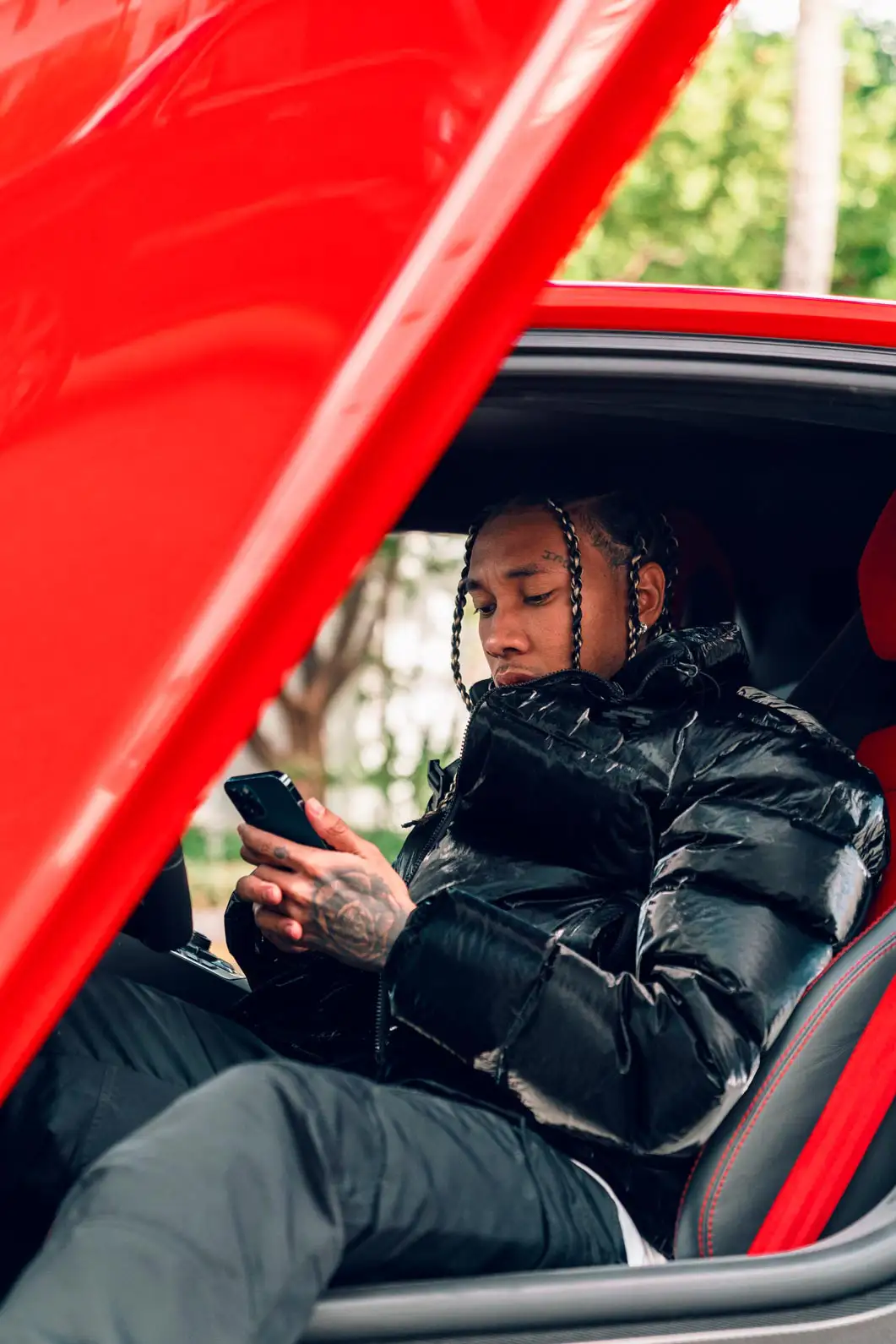 tyga in a red lamborghini aventador s from mph club