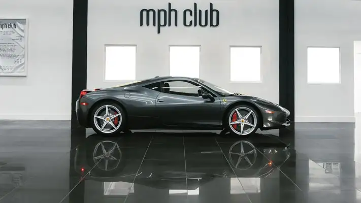 Grey Ferrari 458 Italia rental side view mph club