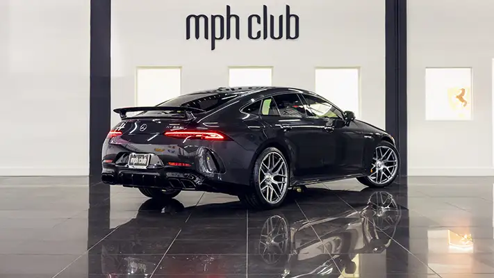 Grey on red Mercedes Benz GT 63 rental rear view mph club