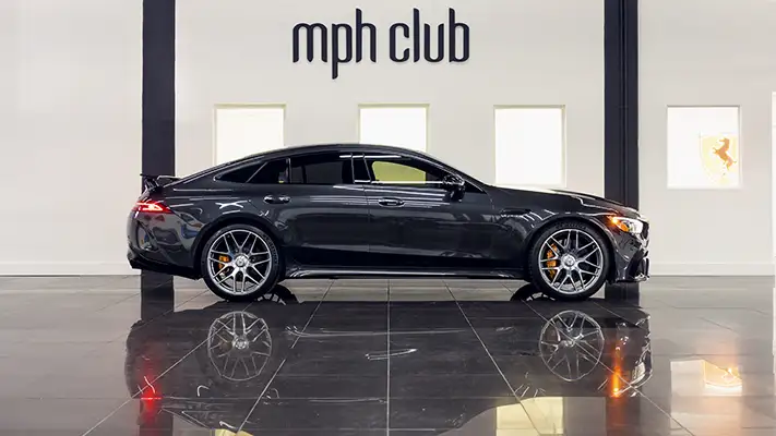 Grey on red Mercedes Benz GT 63 rental side view mph club