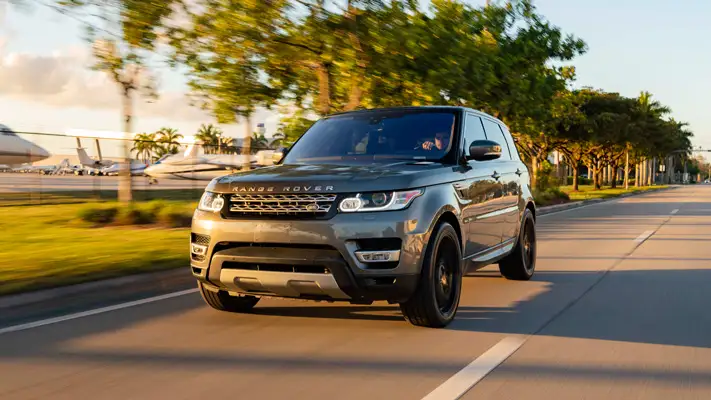 Range Rover Sport HSE rental driving view mph club