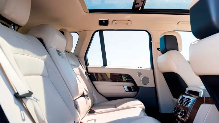 Red Range Rover rental Miami interior view mph club
