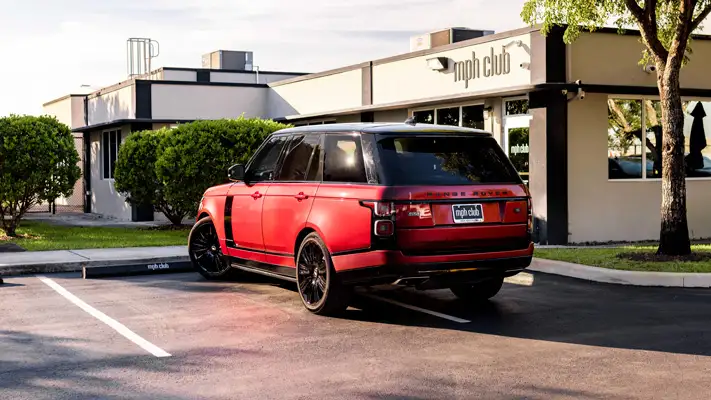 Red Range Rover rental Miami rear view mph club