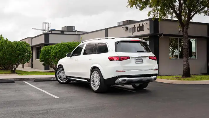 White Mercedes Maybach SUV rental rear view mph club