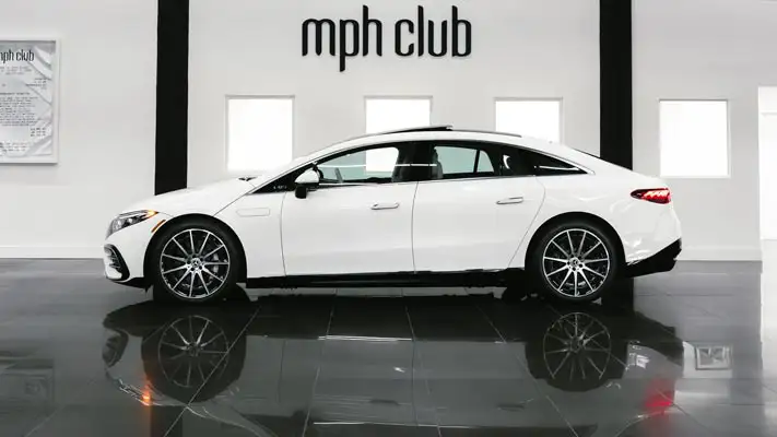 White on white Mercedes Benz EQS rental Miami side view mph club