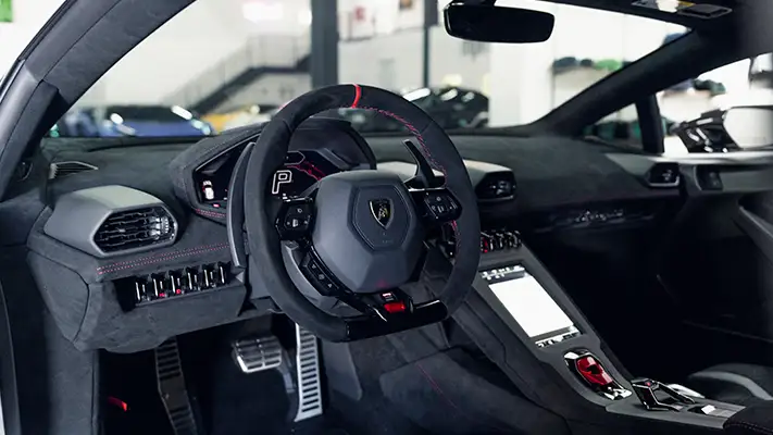 Lamborghini Huracan STO rental Miami dashboard view mph club