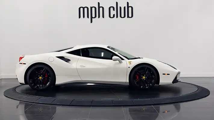 White Ferrari 488 GTB rental side view mph club