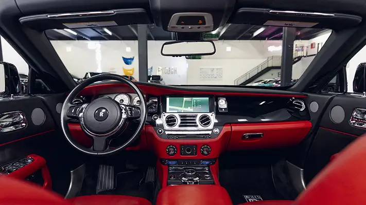 Black Rolls Royce Dawn rental dashboard view turntable mph club