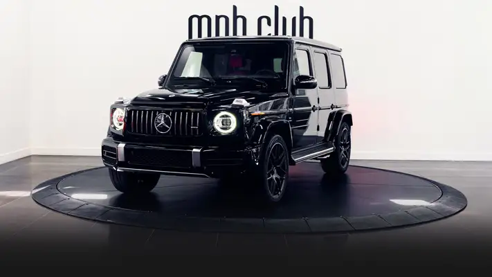 Black with red Mercedes Benz G63 AMG G Wagon rental profile view rszd - mph club