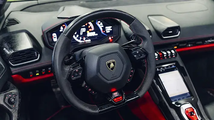 White on red Lamborghini Huracan EVO Spyder rental dashboard view - mph club