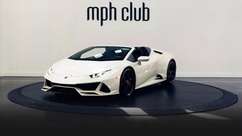 White on red Lamborghini Huracan EVO Spyder rental profile view - mph club