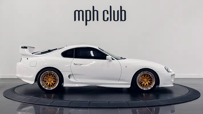 Toyota Supra rental side view - mph club