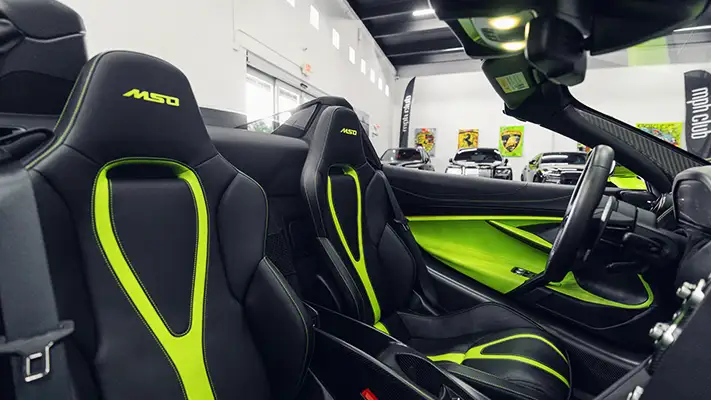 Green McLaren 765LT Spider rental interior view - mph club