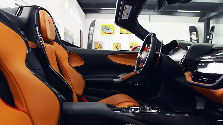 Red Ferrari SF90 Spider profile interior view - mph club