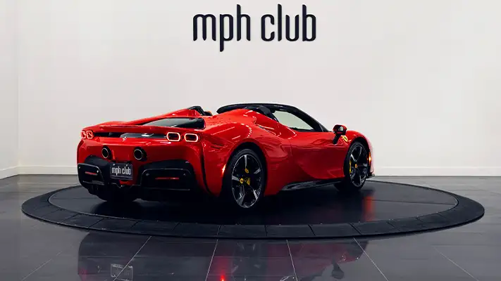 Red Ferrari SF90 Spider rental rear view - mph club
