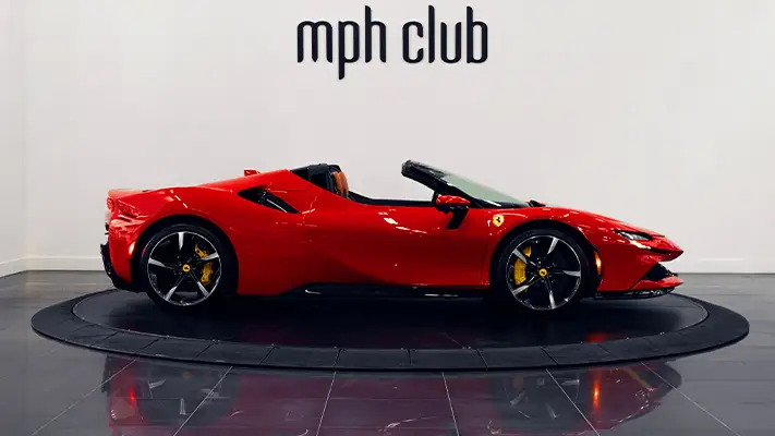 Red Ferrari SF90 Spider rental side view - mph club