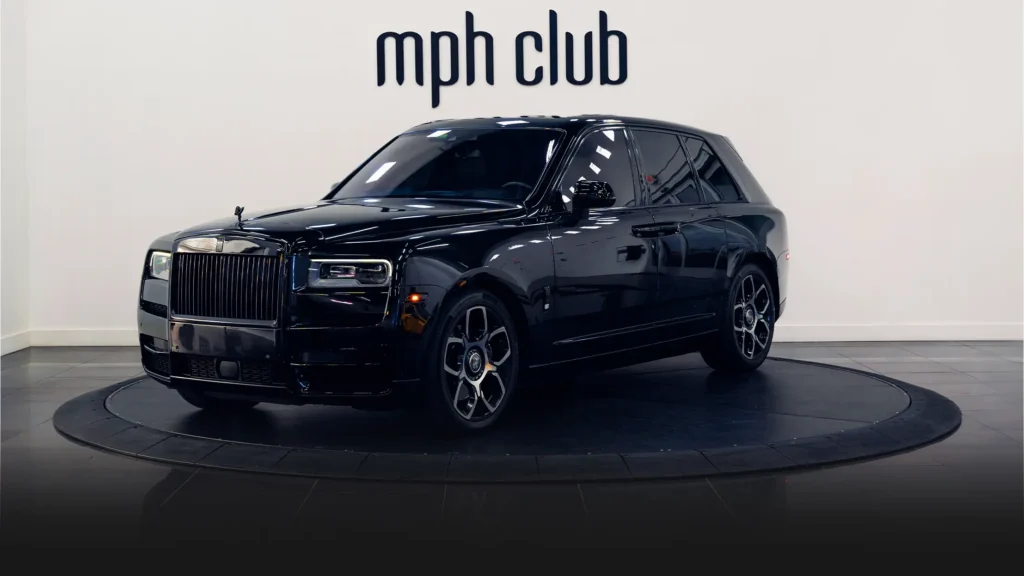 Black on red Rolls Royce Cullinan rental profile view - mph club