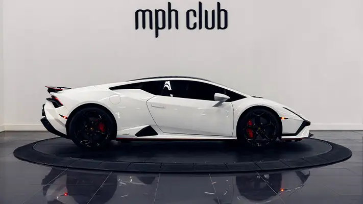 White Lamborghini Huracan Tecnica rental Miami side view - mph club
