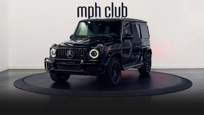 Black on black Mercedes Benz G63 AMG G Wagon rental profile view rszd - mph club