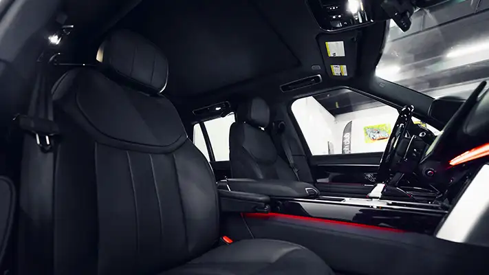 Black on black Range Rover rental interior view - mph club